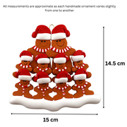 Family ornament with 10 brown gingerbread figures in red Christmas hats, graphed to show size (15x14.5cm).