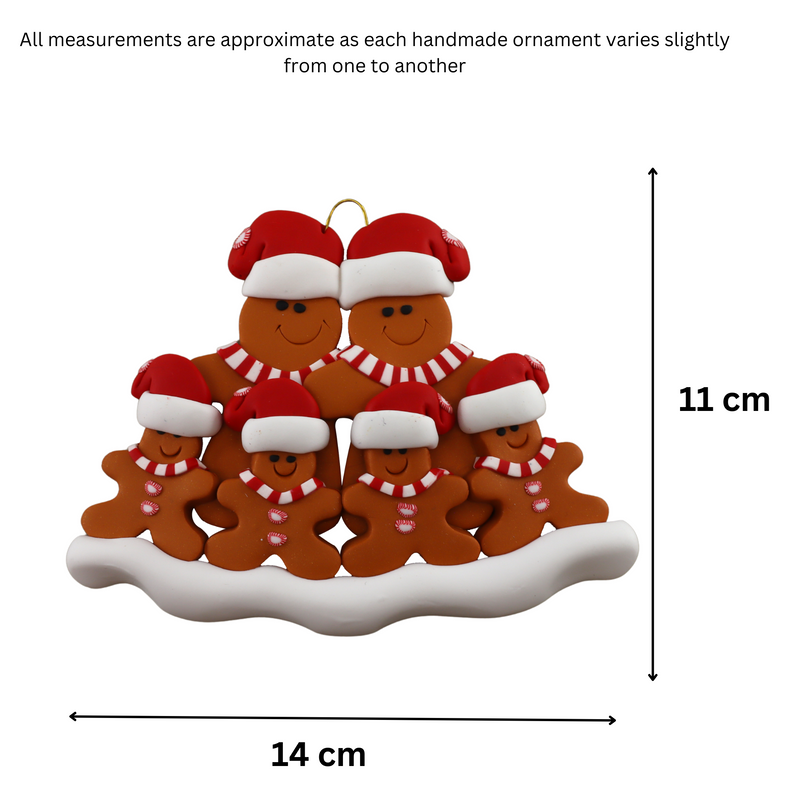 Family ornament with 6 brown gingerbread figures in red Christmas hats, graphed to show size (14x11cm).