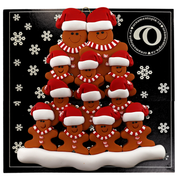 Family ornament with 12 brown gingerbread figures in red Christmas hats, on display backing card.
