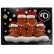 Family ornament with 4 brown gingerbread figures in red Christmas hats, on display backing card.