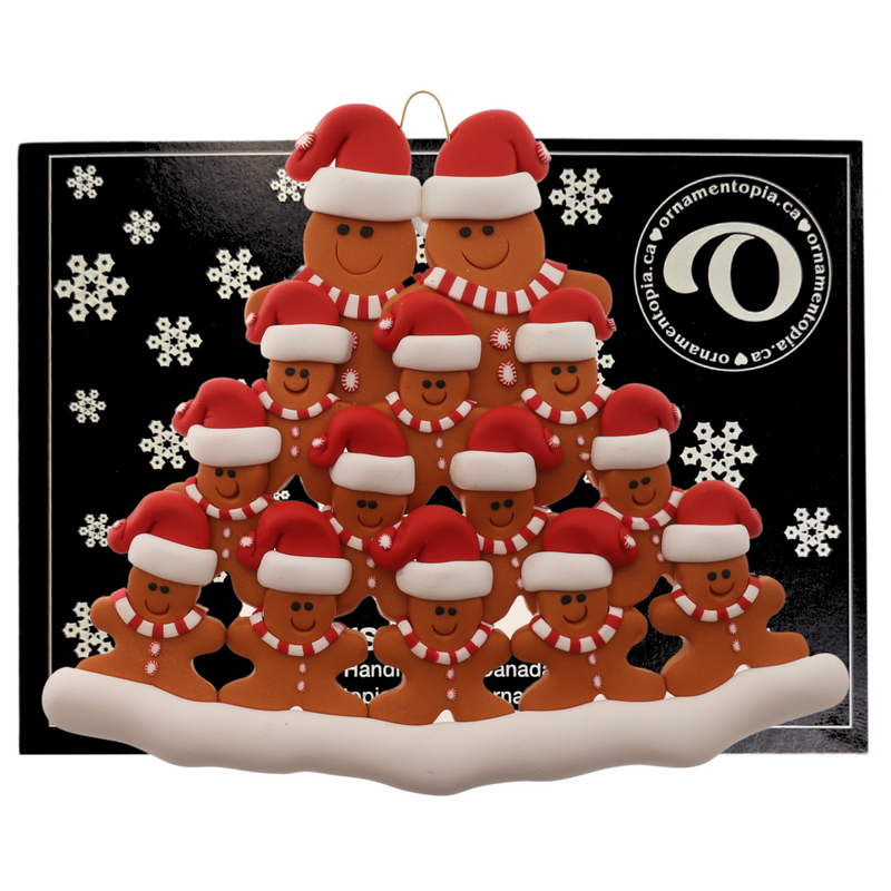 Family ornament with 14 brown gingerbread figures in red Christmas hats, on display backing card.