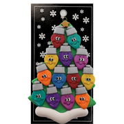 Christmas tree ornament decorated with 13 light bulbs with smiling faces, on display backing card.