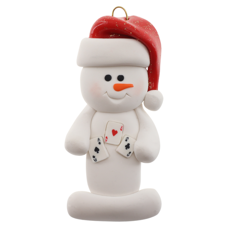 Ornament of white snowman in red hat holding several playing cards.