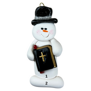 Ornament of white snowman in black top hat, holding a Bible, numbered 1-2 for personalization.