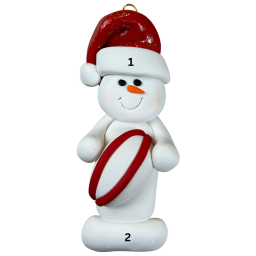 Ornament of white snowman in red hat holding a red and white rugby ball, numbered 1-2 for personalization.