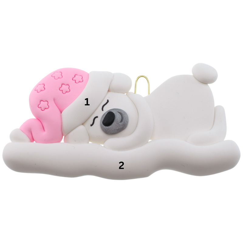 Ornament of white sleeping polar bear baby in a pink hat, numbered 1-2 for personalization.