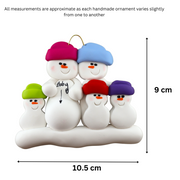 Family ornament with 5 snowmen in bright hats, one pregnant, graphed to show size (10.5x9cm).