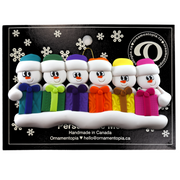 Family ornament with 6 white snowmen in colourful hats holding matching presents, on display backing card.