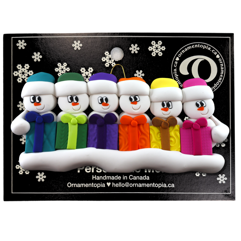 Family ornament with 6 white snowmen in colourful hats holding matching presents, on display backing card.