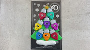 Christmas tree ornament decorated with 8 light bulbs with smiling faces, shown on backing card and decorated Christmas tree.
