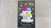 Family ornament with 2 large, 1 small, and 1 infant snowman in blue, shown on backing card and Christmas tree.
