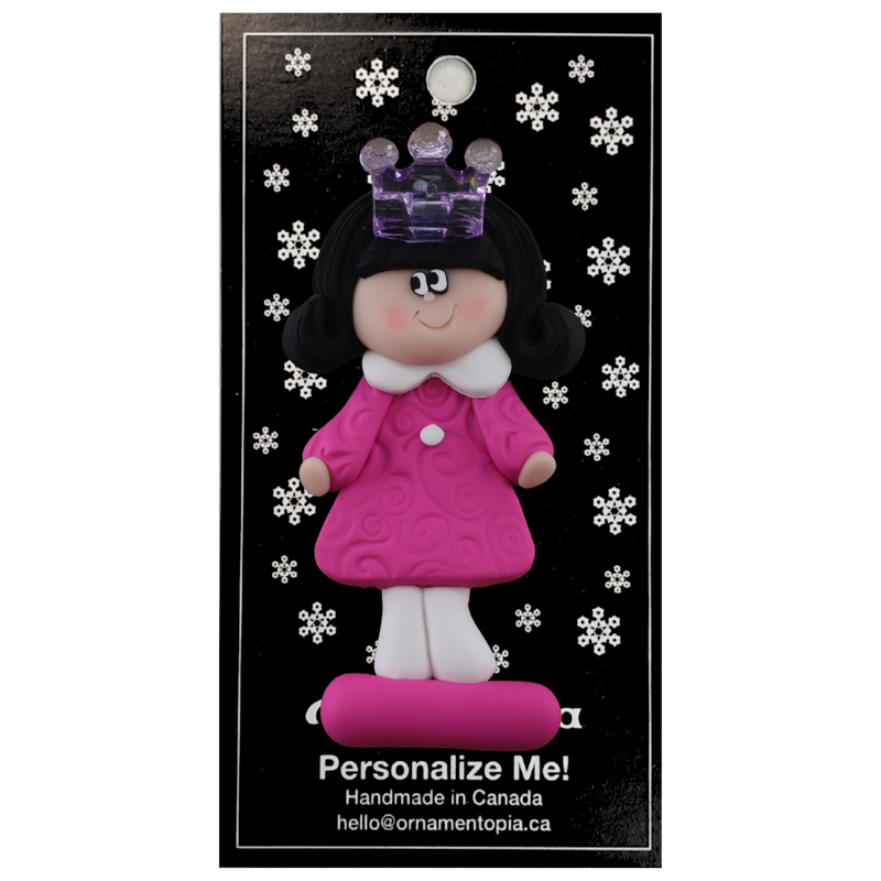 Pink princess with crown and black hair ornament. on display backing card.