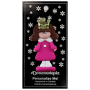 Pink princess with crown and brown hair ornament, on display backing card.