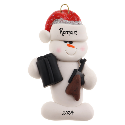 Ornament of white snowman in red hat holding a hunting rifle and pair of binoculars, personalized with name.