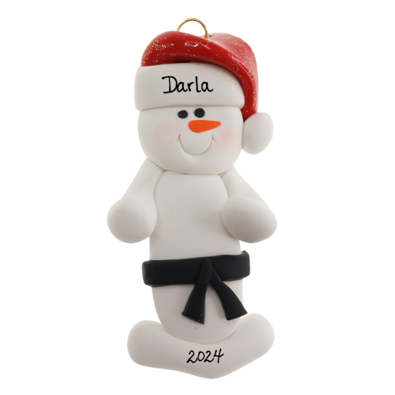 Ornament of white snowman in red hat wearing black belt, personalized with name.