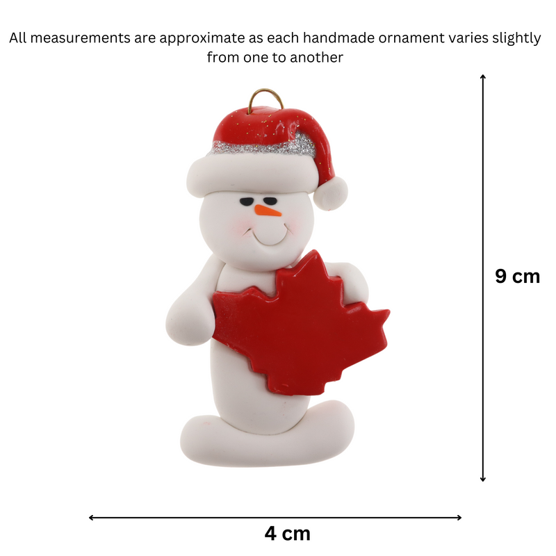 White snowman with red festive hat and maple leaf ornament, graphed to show size (4x9cm).
