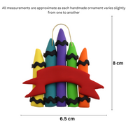 Stack of crayons joined with red ribbon teacher appreciation ornament, graphed to show size (6.5x8cm).