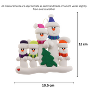Family ornament with 5 white snowmen in bright scarves, with green Christmas tree, graphed to show size (10.5x12cm).