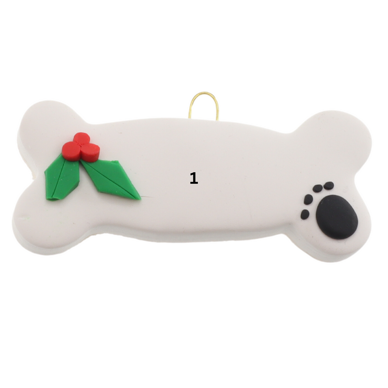 Ornament of dog bone with holly and paw print, numbered for personalization.
