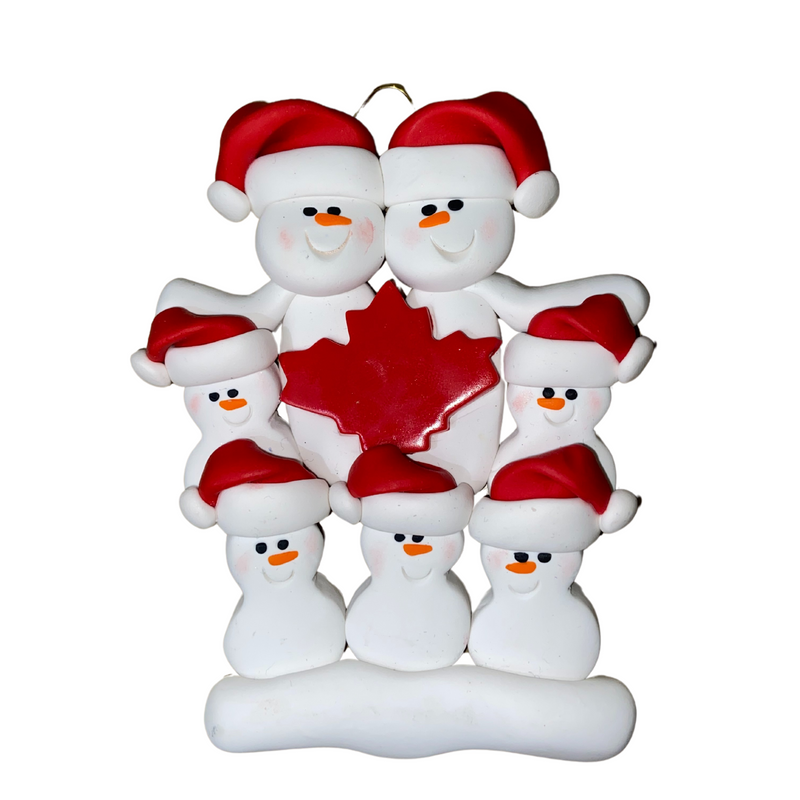 Family ornament with 7 white snowmen in red hats, gathered around a red maple leaf.