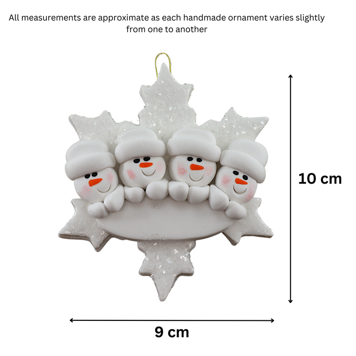 Family ornament with 4 white snowmen stacked on top of a glitter white snowflake, graphed to show size (9x10cm).