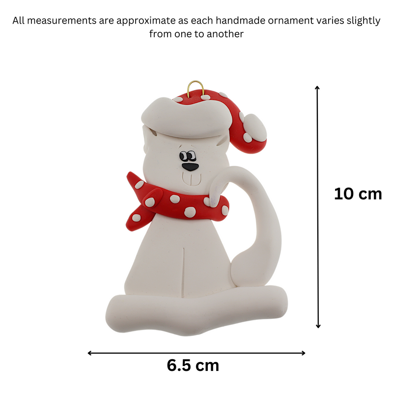 Ornament of white cat in red and white polka dot Christmas hat and scarf, graphed to show size (6.5x10cm).