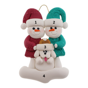 Ornament of snowman couple in red and green shirts and hats with white dog in Christmas hat, numbered 1-4 for personalization.