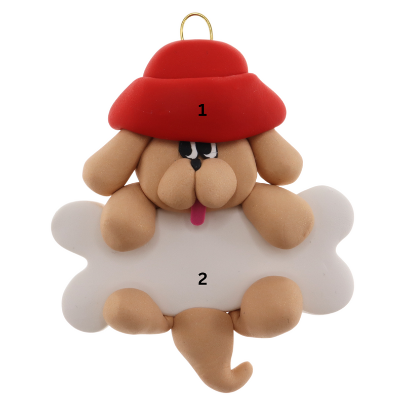 Ornament of tan dog in red hat hanging on a white bone, numbered 1-2 for personalization.