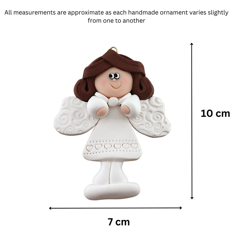 Angel wearing white with brown hair ornament, graphed to show size (7x10cm).
