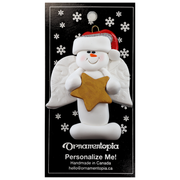 Ornament of white snowman in red hat with angel wings and a golden star, on display backing card.