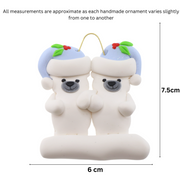 Family ornament with 2 polar bear figures in blue Christmas hats, graphed to show size (6x7.5cm).