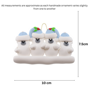 Family ornament with 4 polar bear figures in blue Christmas hats, graphed to show size (10x7.5cm).