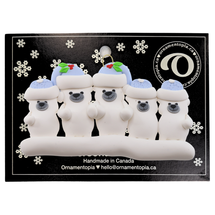 Family ornament with 5 polar bear figures in blue Christmas hats, on display backing card.