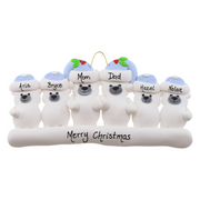 Family ornament with 6 polar bear figures in blue Christmas hats, personalized with names.