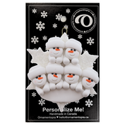 Family ornament with 6 white snowmen stacked on top of a glitter white snowflake, on display backing card.