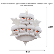 Family ornament with 6 white snowmen stacked on top of a glitter white snowflake, graphed to show size (9x11cm).