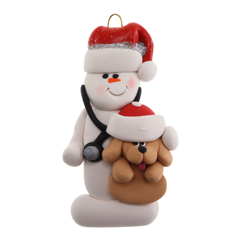 Ornament of white snowman in red hat holding a tan dog and stethoscope.