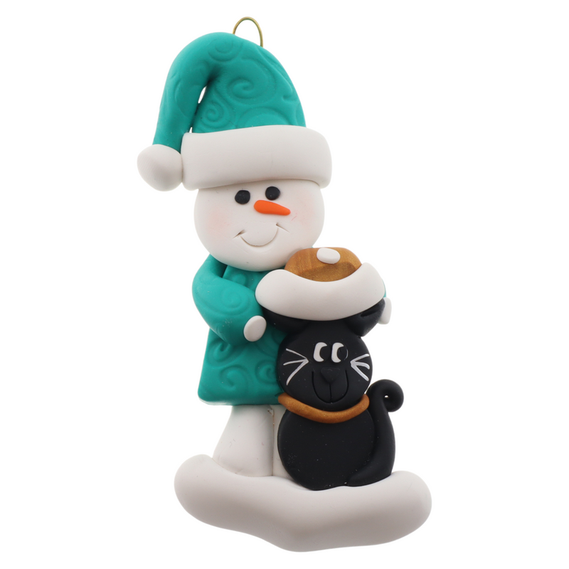 Ornament of snowman in a green shirt and hat with black cat in Christmas hat.