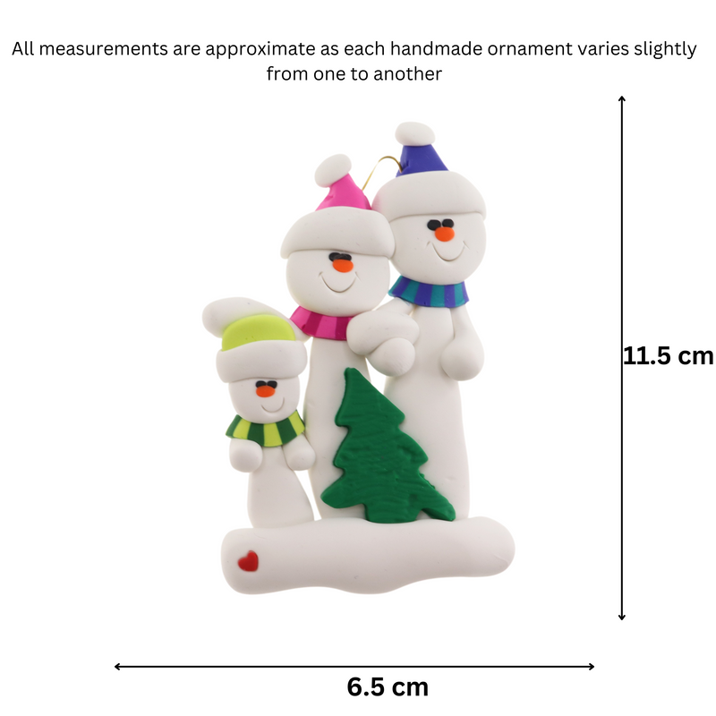 Family ornament with 3 white snowmen in bright scarves, with green Christmas tree, graphed to show size (6.5x11.5cm).